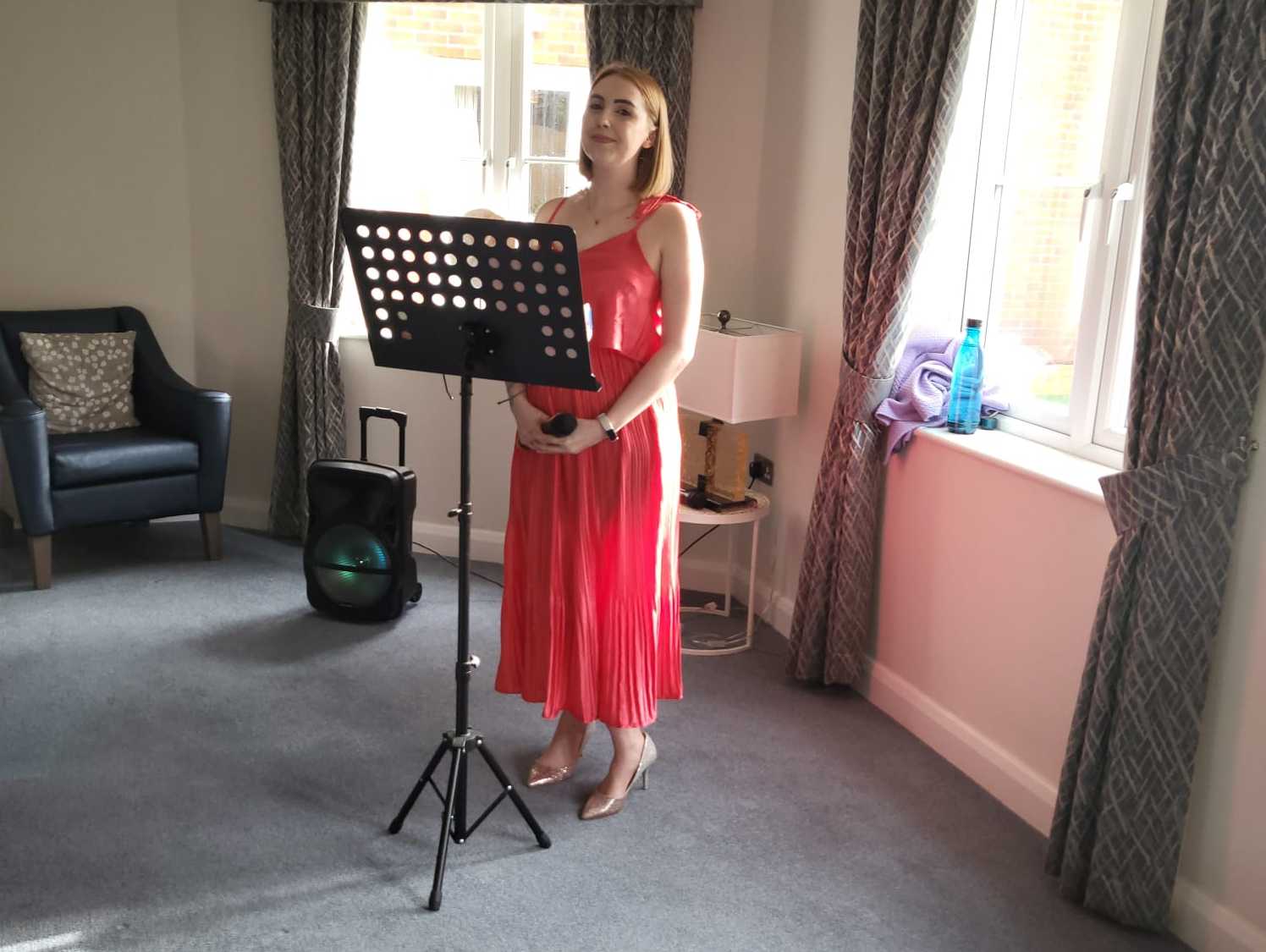 Singer Hannah gets award for bringing joy to Oldbury care home residents