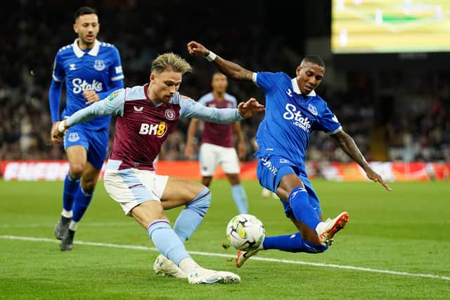Aston Villa's Matty Cash (left) and Everton's Ashley Young