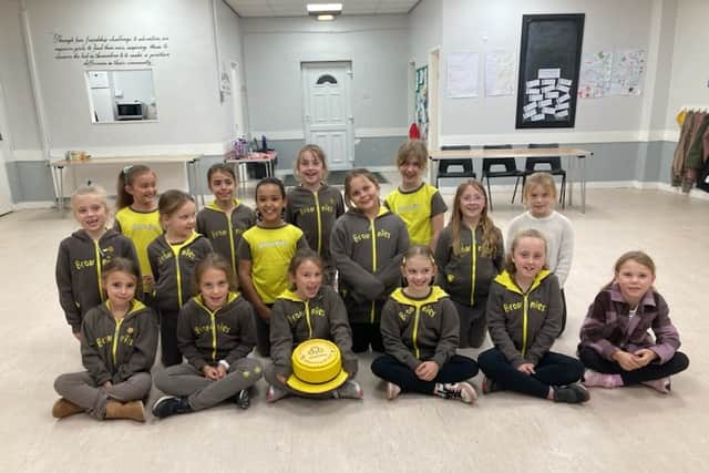 The current Girl guides unit, with a custom made cake.