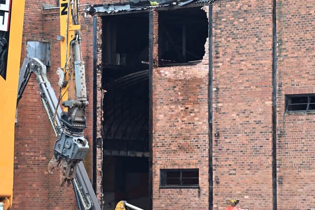 There is now a large hole in the side of the building