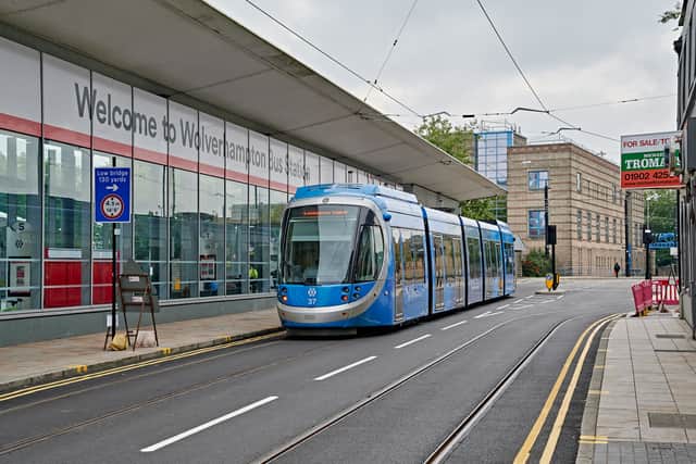 The tram running past Wolverhampton Bus Station. Photo: John Whitehouse.