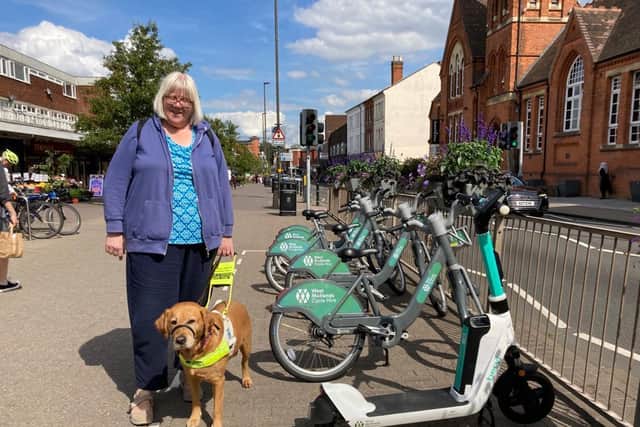 Clare Williams from Birmingham Sight Loss Council with her guide dog Quita. Credit: LDRS.