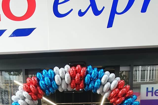 A steady stream of people were heading into the store after the grand opening