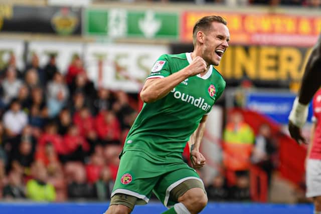 Chris Hussey celebrates pulling one back (Owen Russell)
