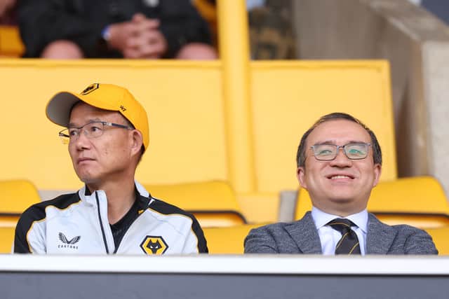 Jeff Shi (right) and Fosun chairman Guo Guangchang