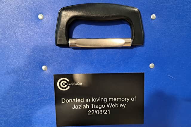 The cuddle cot bearing Jaziah’s name