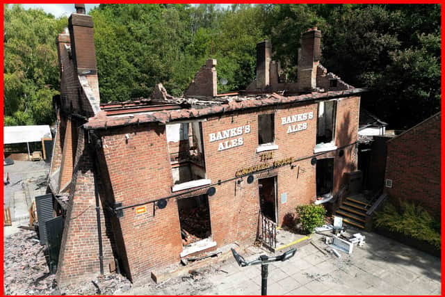 The burnt out remains of The Crooked House pub near Dudley. See PA story FIRE Crooked. Photo credit should read: Jacob King/PA Wire.