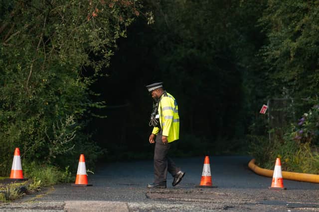 Police near The Crooked House today