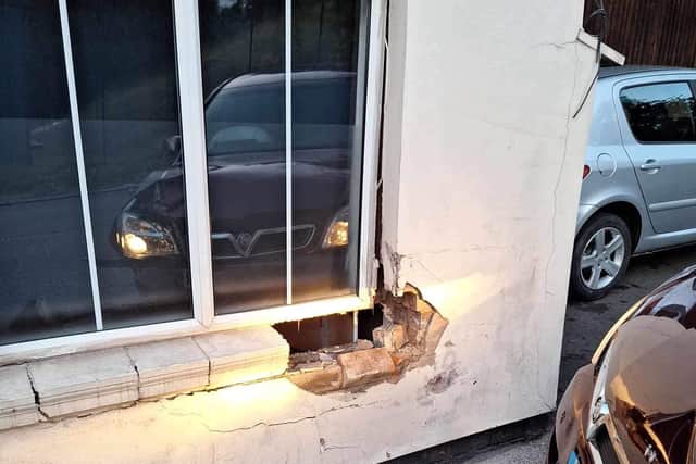 The Vauxhall after it crashed into the house