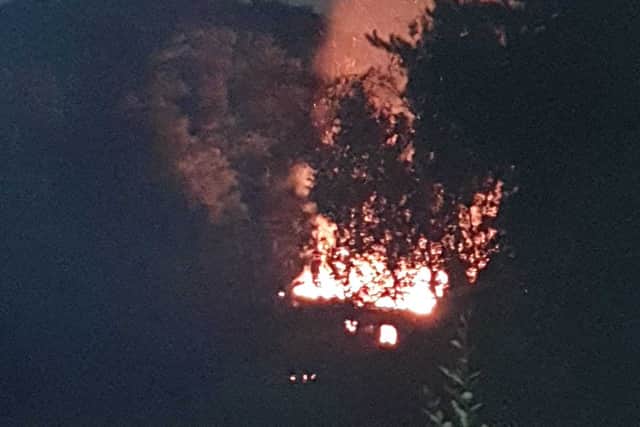 The Crooked House on fire on Saturday night. Photo: Ash Smith