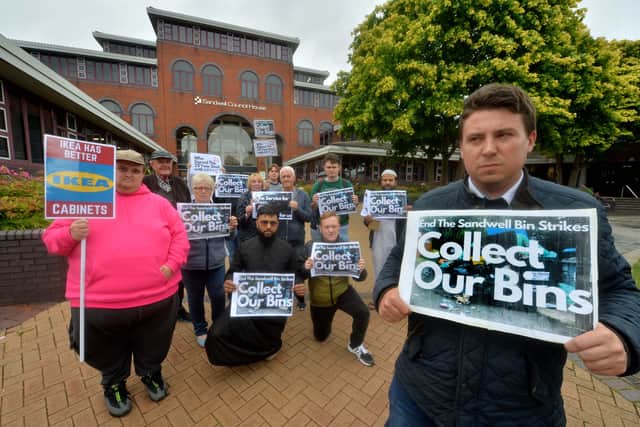 West Bromwich West MP Shaun Bailey and placard-waving residents protest outside Sandwell Council House in Oldbury