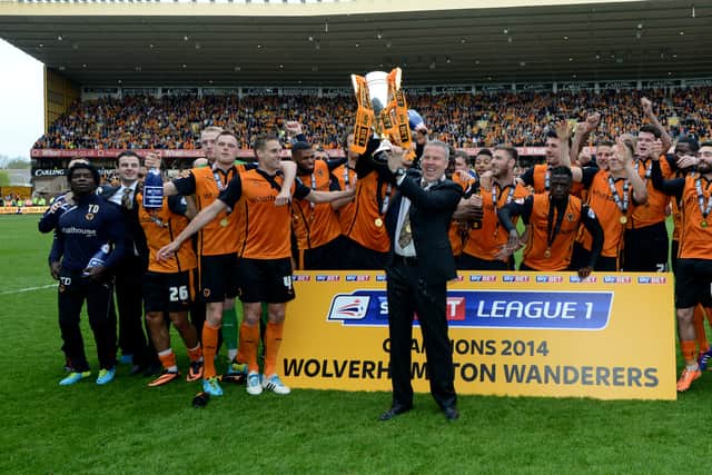 Gallen celebrating with Wolves after securing promotion back to the Championship 