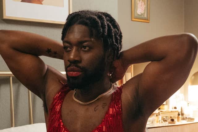 Natey Jones as Travis in Pretty Red Dress