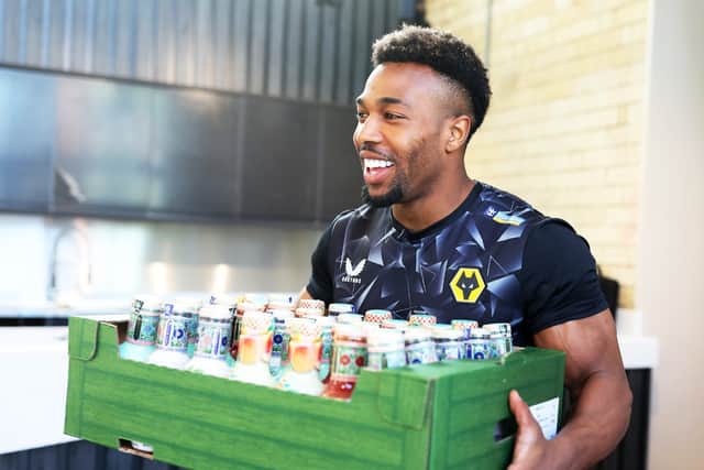 The footballer helped at the Community Centre