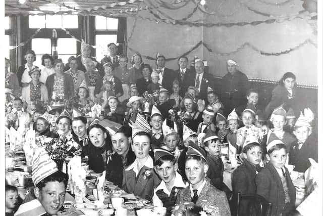 Douglas' father Dan is on the right hand back row, second from the right with Douglas brother Donald stting in front of him