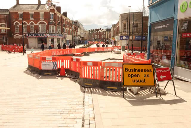 Signs say businesses are open as usual, but several have gone under while the work has been in progress. Photo: David Linney Photography