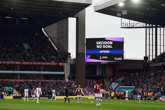 VAR rules out a goal scored by Crystal Palace's Wilfried Zaha 