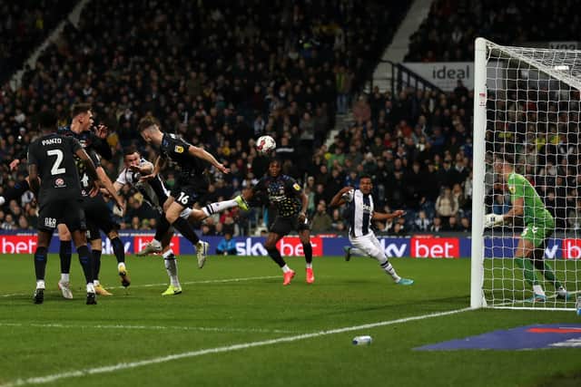 Jed Wallace flicks it on for Grady Diangana to open the scoring (Photo by Adam Fradgley/West Bromwich Albion FC via Getty Images).