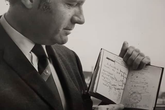 John Stonehouse with his much-stamped passport in 1971 (agency pic)