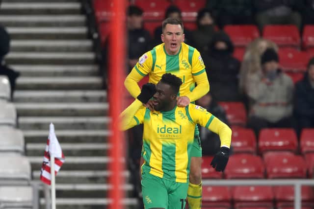 Daryl Dike of West Bromwich Albion celebrates after scoring a goal to make it 1-2 with Jed Wallace of West Bromwich Albion during the Sky Bet Championship between Sunderland and West Bromwich Albion at Stadium of Light on December 12, 2022 in Sunderland, United Kingdom. (Photo by Adam Fradgley/West Bromwich Albion FC via Getty Images).