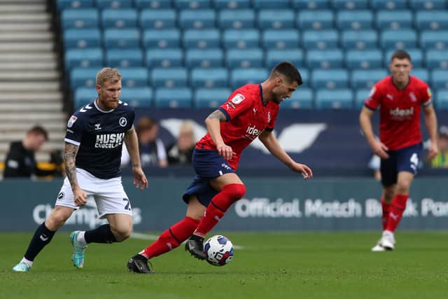Okay Yokuslu of West Bromwich Albion and Andreas Voglsammer of Millwall during the Sky Bet Championship between Millwall and West Bromwich Albion at The Den on October 22, 2022 in London, United Kingdom. (Photo by Adam Fradgley/West Bromwich Albion FC via Getty Images).