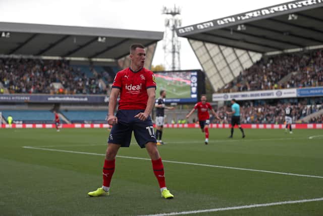Jed Wallace of West Bromwich Albion celebrates the goal scored by John Swift of West Bromwich Albion during the Sky Bet Championship between Millwall and West Bromwich Albion at The Den on October 22, 2022 in London, United Kingdom. (Photo by Adam Fradgley/West Bromwich Albion FC via Getty Images).