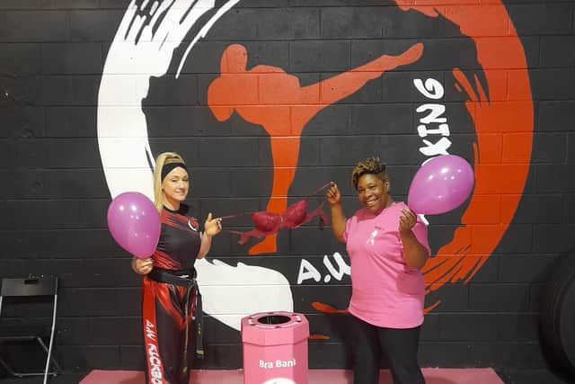 Pauline Bennett and Amii Weaver, owner of AW Kickboxing, get the series of fitness sessions going
