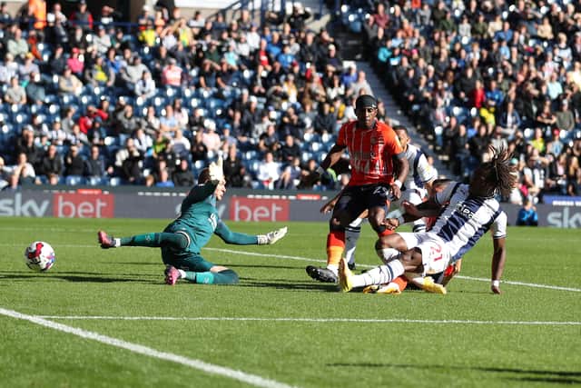 Thomas-Asante in action for Albion