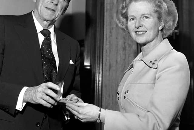 Ronald Reagan with Margaret Thatcher, who brought variants of neoliberalism to the Western world. 