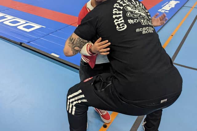 Tom Hardy with awestruck young fan Ollie. Photo: Carla Frost