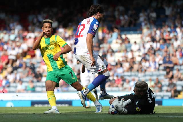 Ben Brereton Diaz of Blackburn Rovers and Thomas Kaminski of Blackburn Rovers combine to stop Callum Robinson of West Bromwich Albion during the Sky Bet Championship between Blackburn Rovers and West Bromwich Albion at Ewood Park on August 14, 2022 in Blackburn, United Kingdom. (Photo by Adam Fradgley/West Bromwich Albion FC via Getty Images).