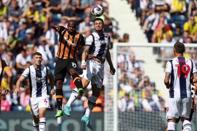 Oscar Estupinan of Hul City and Okay Yokuslu of West Bromwich Albion during the Sky Bet Championship between West Bromwich Albion and Hull City at The Hawthorns on August 20, 2022 in West Bromwich, United Kingdom. (Photo by Adam Fradgley/West Bromwich Albion FC via Getty Images).