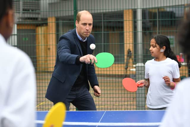 The Duke of Cambridge playing table tennis during a visit to The Way Youth Zone in 2021