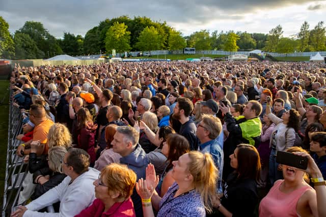 Bryan Adams fans in Telford town park. Photo: Jonathan Hipkiss