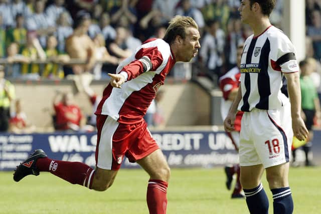 Paul Merson celebrates scoring the opening goal