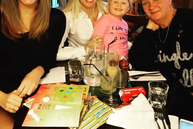 Alice Bailey and Samantha Bailey with their mother, Katherine Bailey