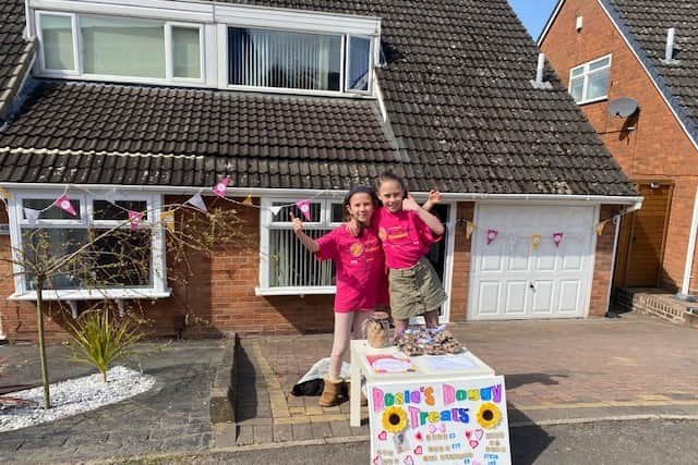 Rosie set up shop in her street to sell dog biscuits and sold out in 90 minutes