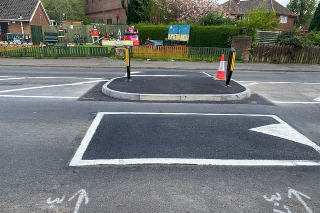 Newly installed speed bumps on Dixon Street