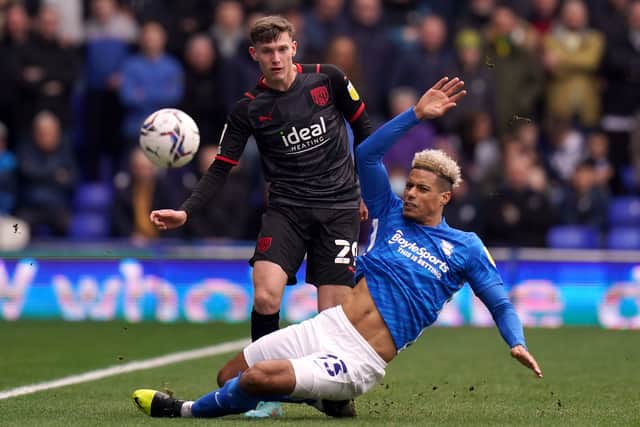               West Bromwich Albion's Taylor Gardner-Hickman (left) and Birmingham City's Lyle Taylor 