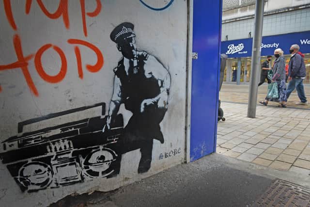 Local street artist Skore painted this piece last year