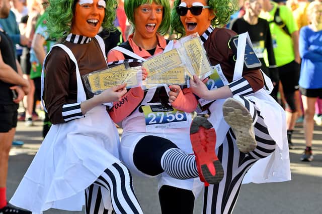 STAFFORD COPYRIGHT MNA MEDIA TIM THURSFIELD 20/03/22.Stafford Half Marathon in Stafford town centre..Izzy Dutton, Natalie Wrench and Steph Wood and their golden tickets!.