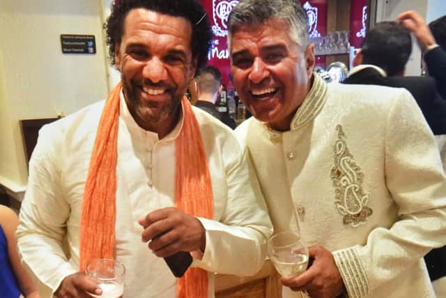 Surseh Bawa with ex Wolves and Albion star Don Goodman at a charity Bollywood night
