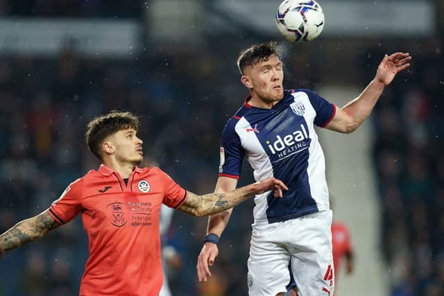Swansea City's Jamie Paterson (left) and West Bromwich Albion's Dara O'Shea 