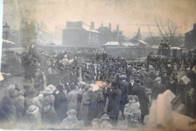 The funeral for the victims of the factory explosion that happened in 1922