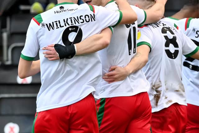 George Miller celebrates his goal