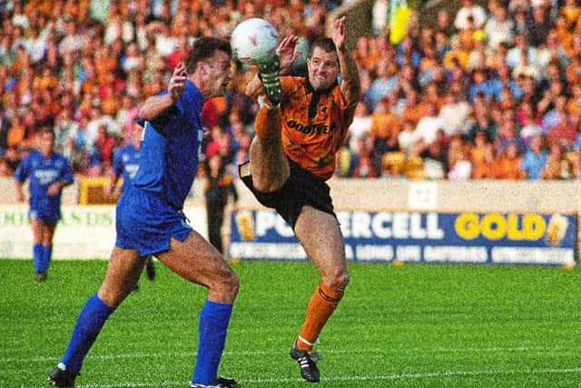 A full-blooded challenge by the two club legends 