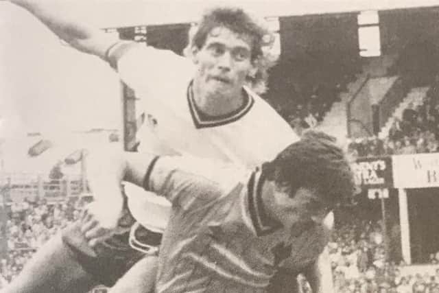 Up against Wolves defender Rob Hindmarch (who has since passed away)