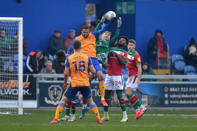 Carl Rushworth claims the ball
