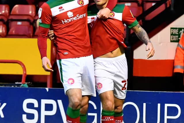Otis Khan celebrates his first goal...
