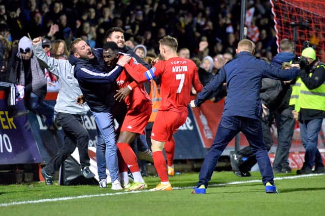 Fans jump all over Amari Morgan-Smith and Sam Austin..